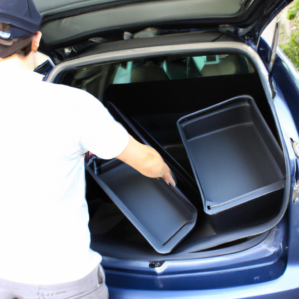 Person organizing car trunk storage
